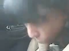 Before we go for work, a black-haired, black-cock harlot blows my erect pecker in the car.